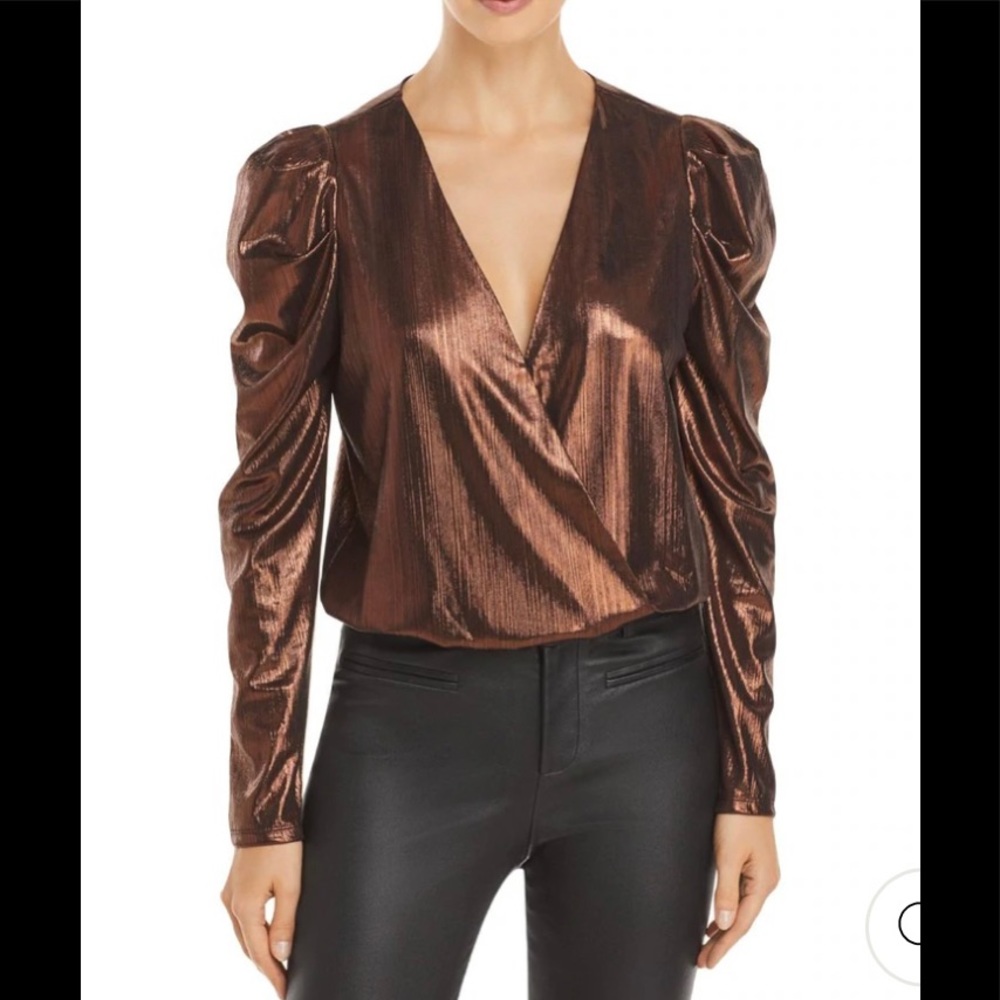 “HOST PICK” Shimmery V-Neck Bodysuit. 100 Polyester. Long sleeves.